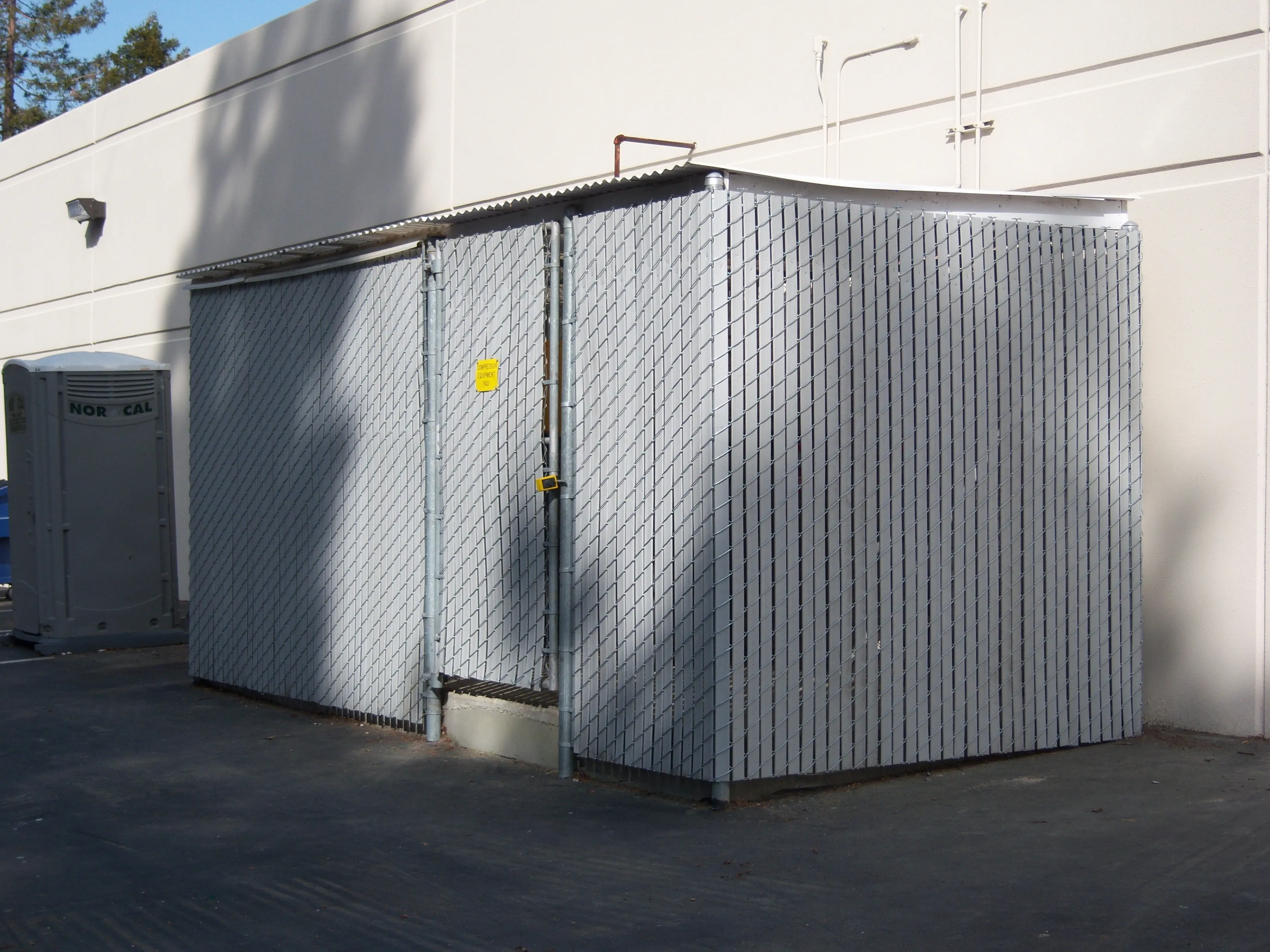 Chain-link security enclosure installed by Pacific Security Fence