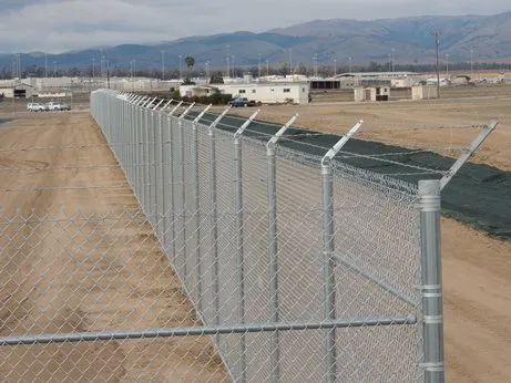 High-security perimeter fencing installed by Pacific Security Fence at a California correctional facility